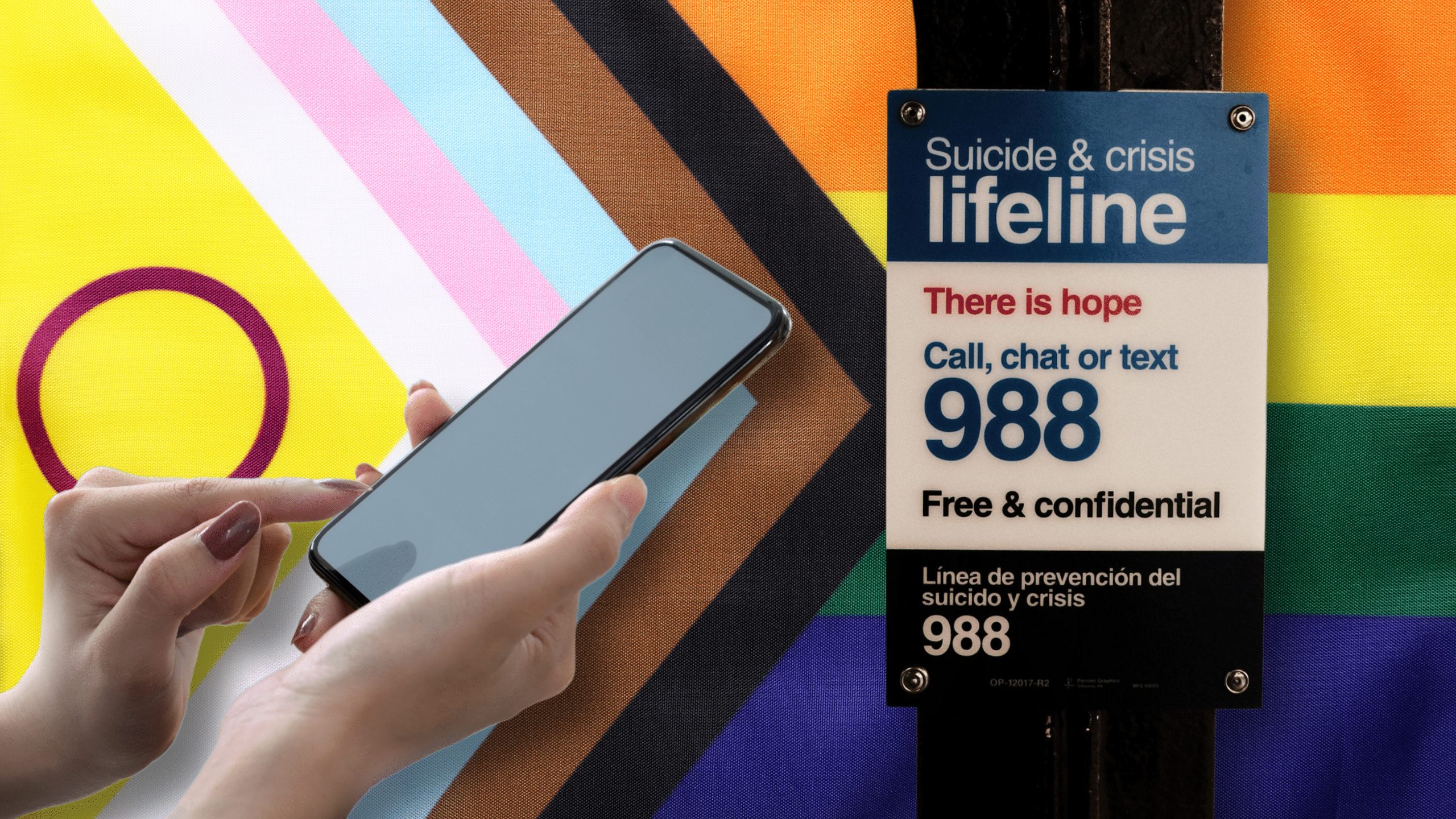 An advertisement for the 988 hotline is in the foreground with a person holding a phone. A Pride flag is in the background.