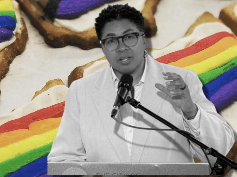 Letha Pugh standing in front rainbow cookies