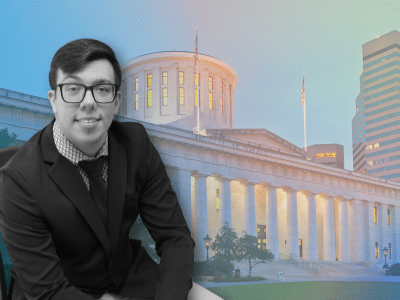 Christopher Elder's headshot is in black-and-white and is photoshopped in front of a photo of the Ohio Statehouse in a purple-ish gradient.